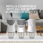 Air Wick Scented Oil Air Freshener Kit, Vanilla & Pink Papaya 2 Warmers +7 Refills